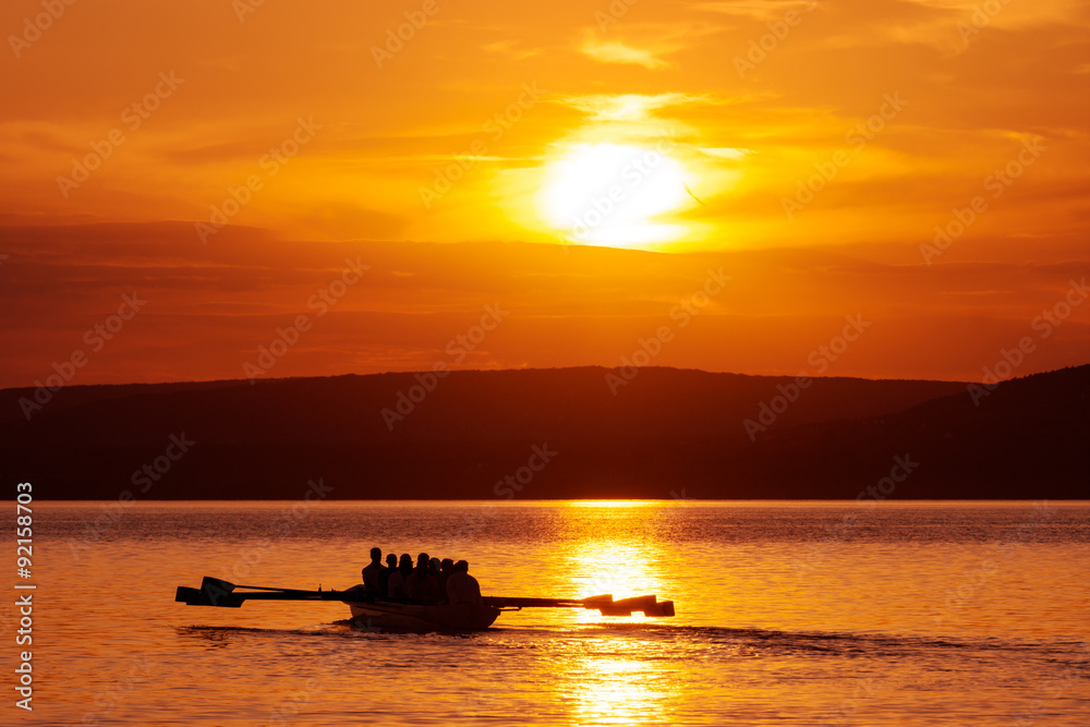Rowing boat at sunset on Balaton lake