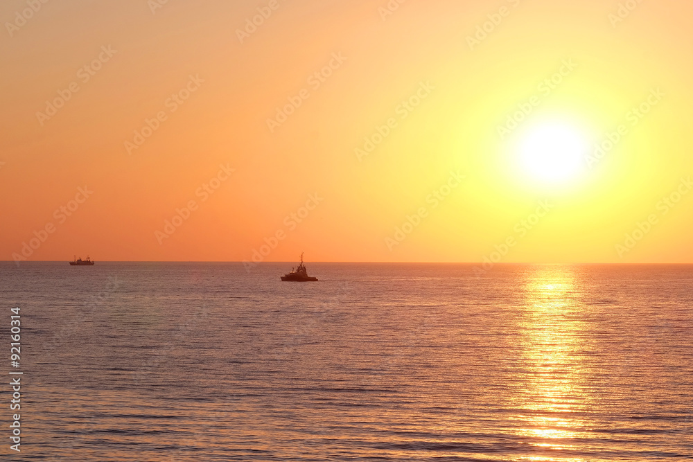 Landscape with the image of a sea sunset