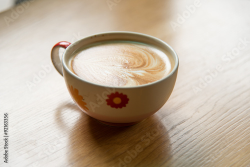 Hot Coffee Art on wood table.