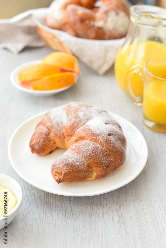 delicious breakfast with fresh croissants and orange juice delicious breakfast with fresh croissants and orange juice