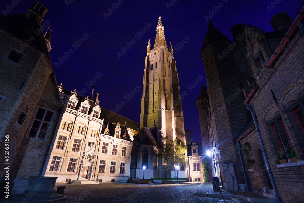 Church of Our Lady Bruges from cobblestone  road