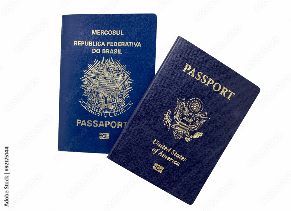 United States and Brazil Passport With Biometrics Isolated on White United States and Brazil Passport With Biometrics Isolated on White