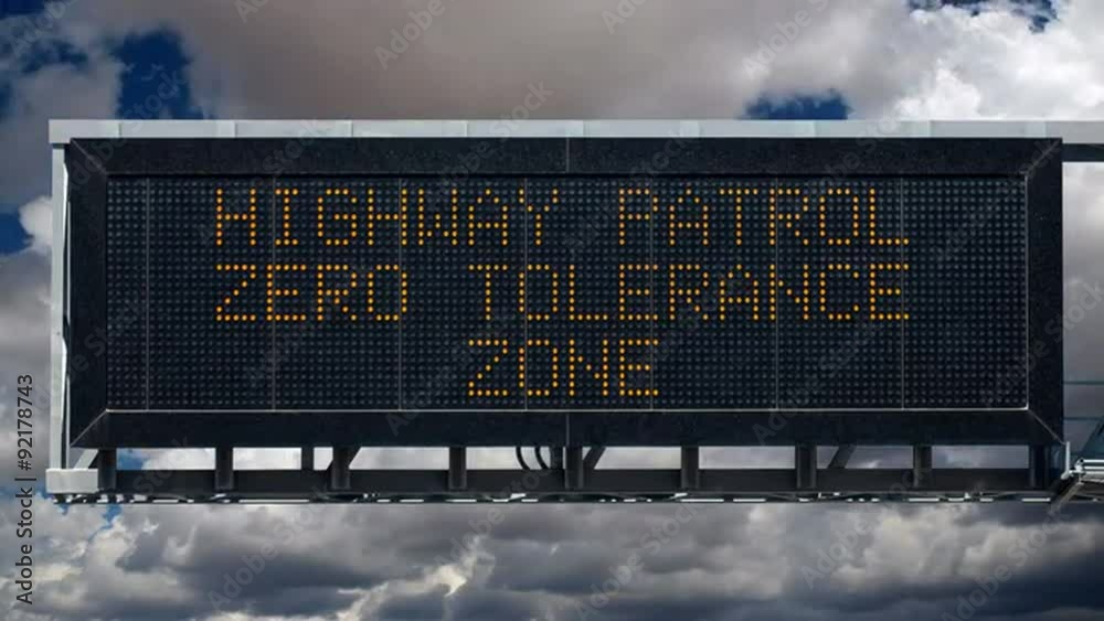 Zero Tolerance Highway Patrol Warning Sign with Time Lapse Clouds Stock ビデオ Adobe Stock