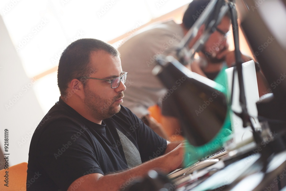 startup business, software developer working on computer startup business, software developer working on computer