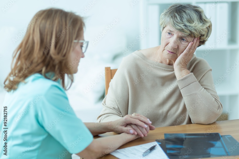 Fototapeta premium Consoling old patient