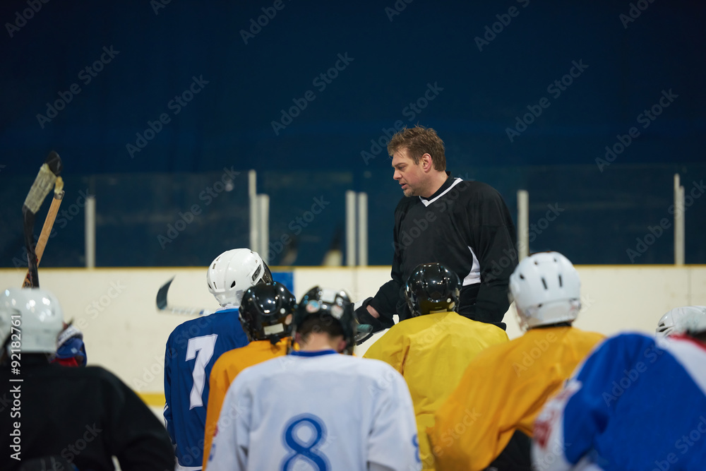 Fototapeta premium ice hockey players team meeting with trainer