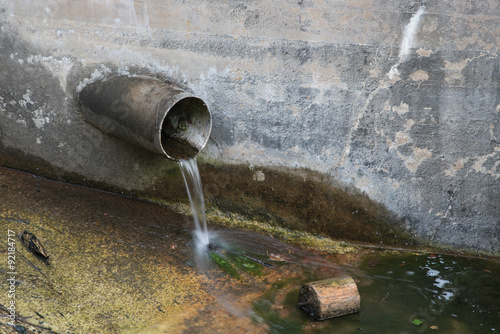 Water Pouring From Pipe Wide