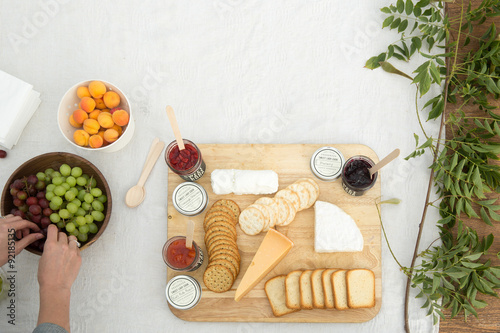 Cheese and cracker platter with fresh fruits