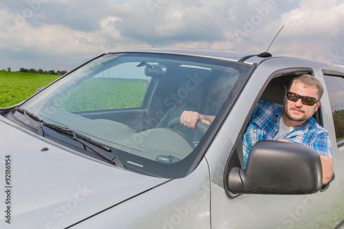 Man sitting in a car
