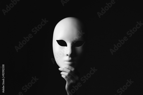 Tela mask in hand.halloween
