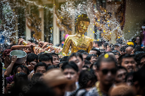 NONGKHAI THAILAND APRIL 13: Songkran Festival, The people pour water and joined parade of the statue of Luang Pho Phra Sai with respect to faith on April 13, 2011 in Nongkhai Thailand.