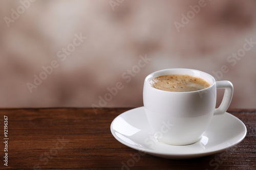 Cup of coffee on table close up