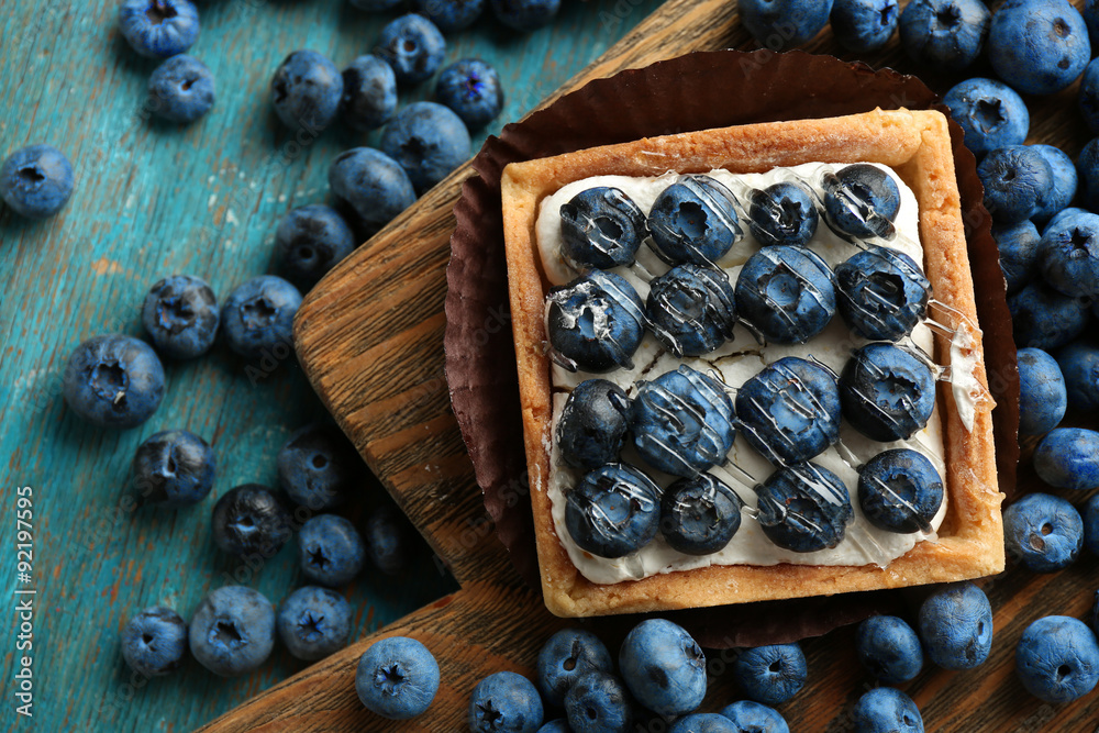 Gourmet fresh blueberry tarts on table Gourmet fresh blueberry tarts on table