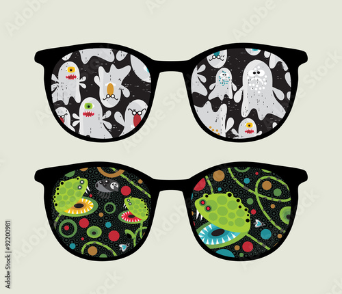 Retro sunglasses with monsters reflection in it.