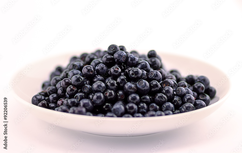 blueberries in a white plate
blueberries in a white plate