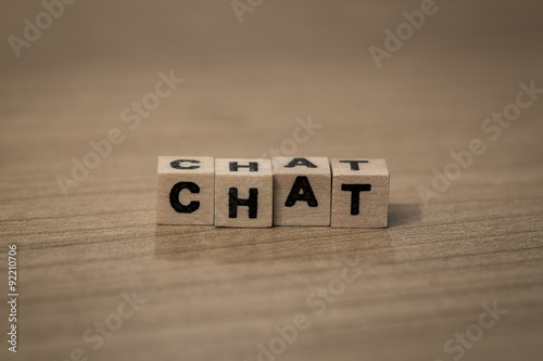 Chat in wooden cubes