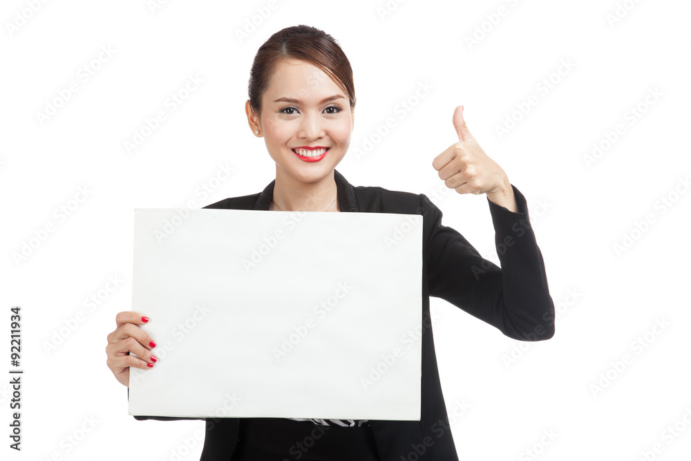 Young Asian business woman show thumbs up with white blank sign Young Asian business woman show thumbs up with white blank sign