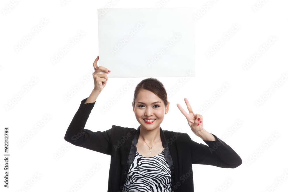Young Asian business woman show victory sign with blank sign Young Asian business woman show victory sign with blank sign