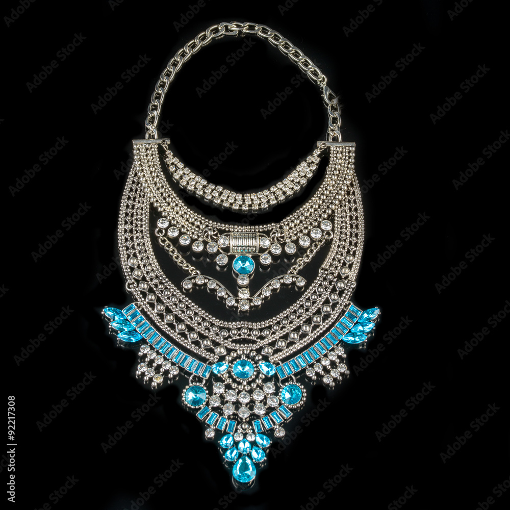 jewelry and bracelets on a black background
jewelry and bracelets on a black background