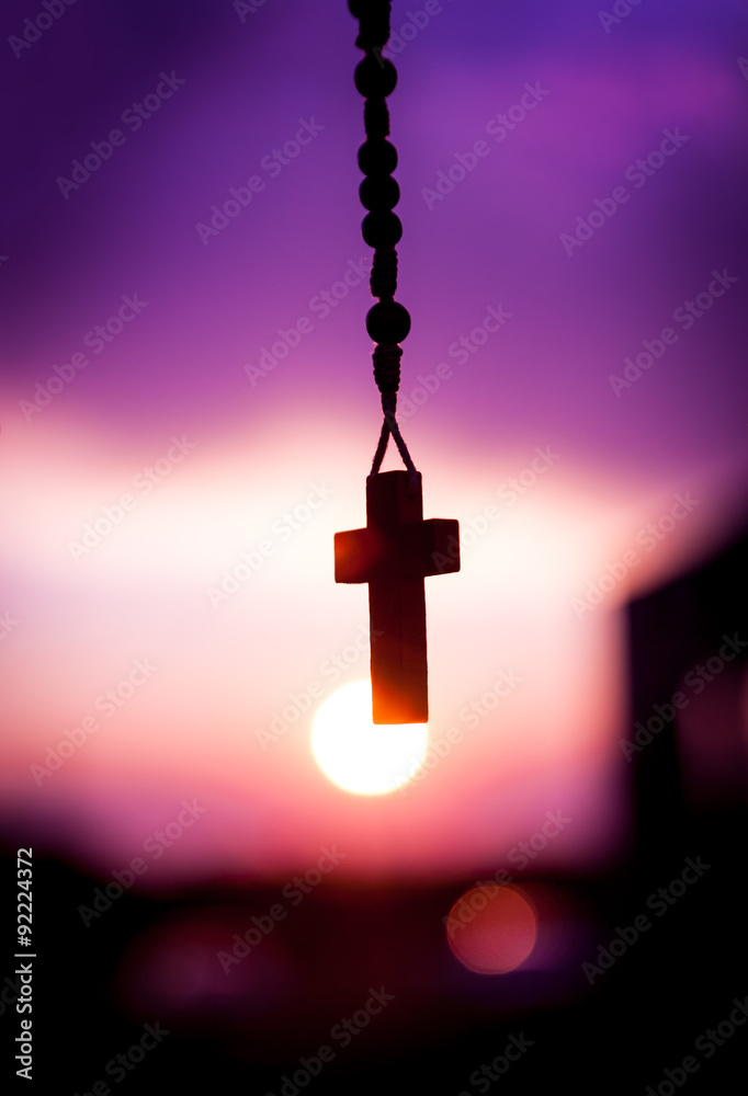 rosary beads with beautiful sunset background Stock Photo | Adobe Stock