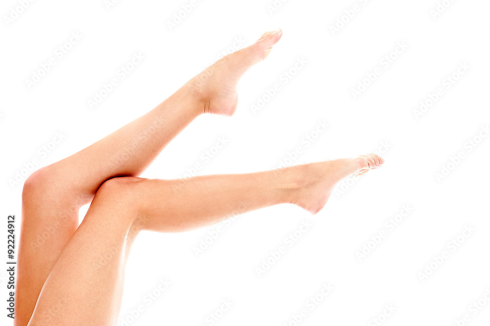 Perfect female legs shot over white Perfect female legs shot over white
