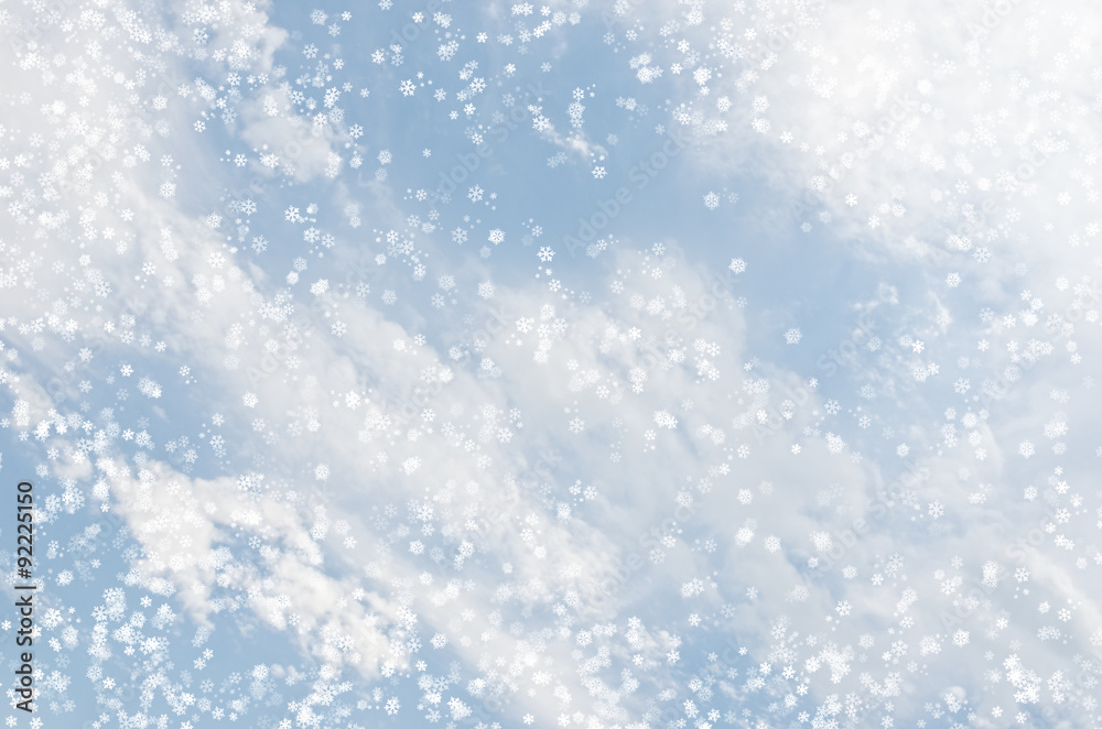 Fototapeta premium Falling snowflakes on blue background