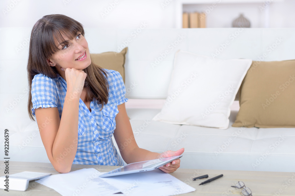 Woman using her tablet to study Woman using her tablet to study