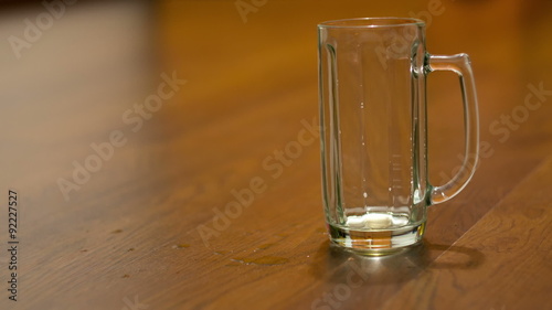 Emptying beer mug, drinking beer, time lapse
