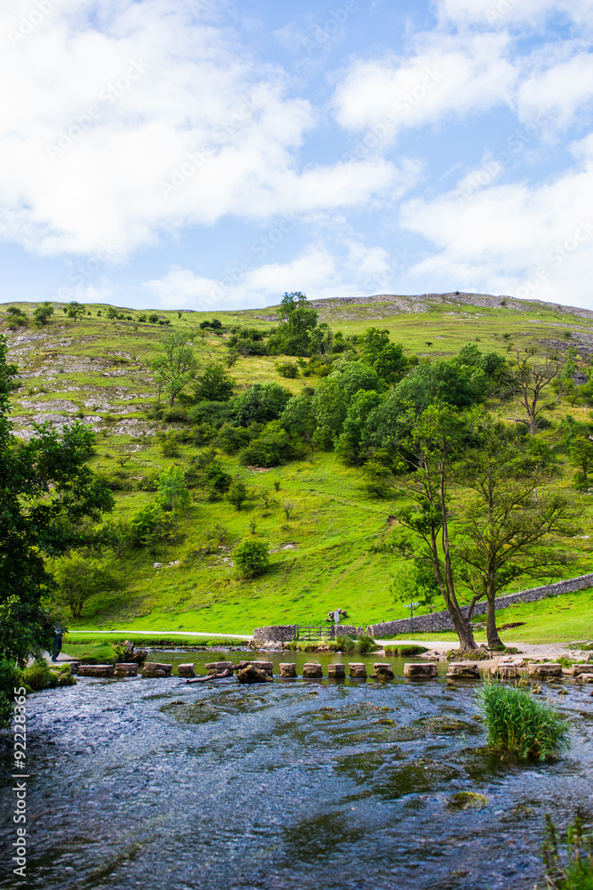 Green Hills, Stepping Stones near River Dove in Peak District Na Green Hills, Stepping Stones near River Dove in Peak District Na