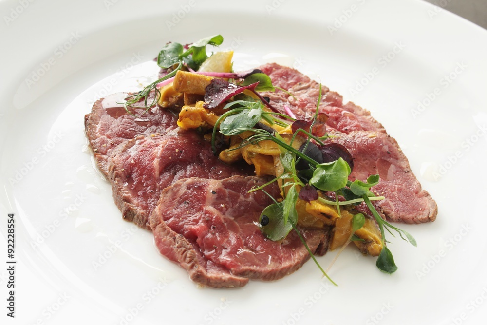beef carpaccio plated appetizer starter beef carpaccio plated appetizer starter