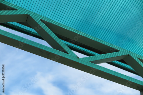 Fototapeta Naklejka Na Ścianę i Meble -  Arc polycarbonate canopy against a blue sky