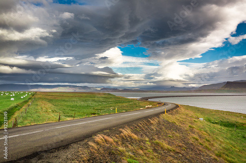 Road in rainy day by the se...