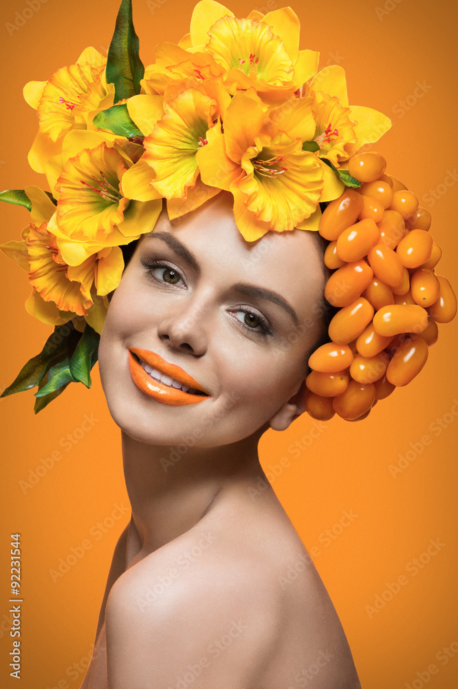 Girl with orange tomatoes and flowers Girl with orange tomatoes and flowers