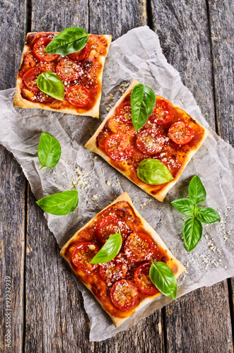 Pie with tomatoes, cheese and Basil