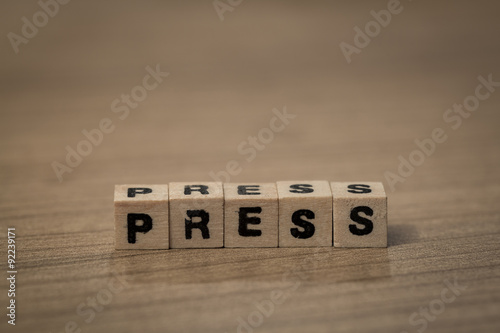 Press in wooden cubes