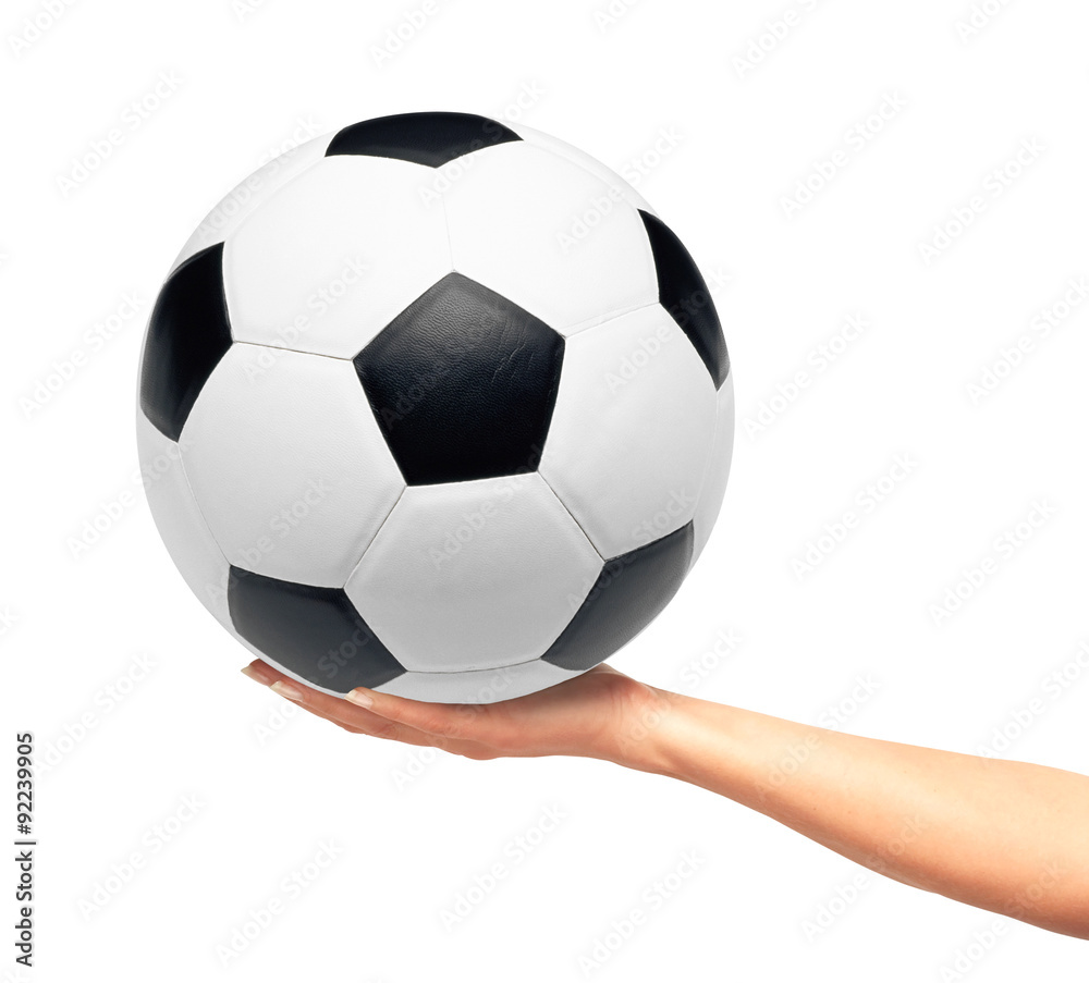 Hand holding soccer ball isolated on white