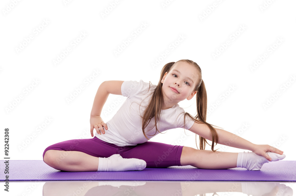 Little girl doing fitness exercises Little girl doing fitness exercises