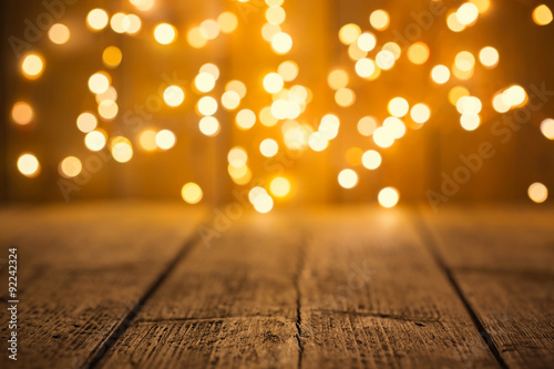 Christmas Bokeh background with empty wooden table