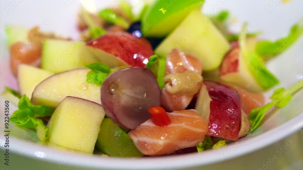 Video of raw salmon sashimi with fruit salad Video of raw salmon sashimi with fruit salad