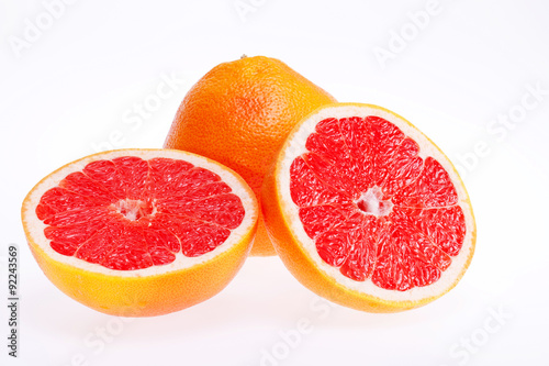 cut fruit of grapefruit isolated on white background