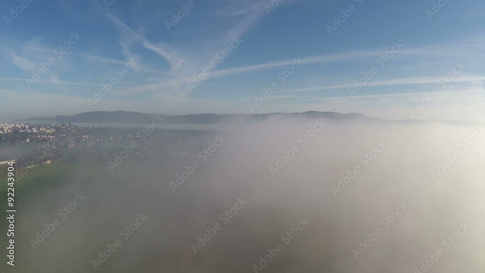 Aerial view of Central Switzerland over a sea of fog Aerial view of Central Switzerland over a sea of fog