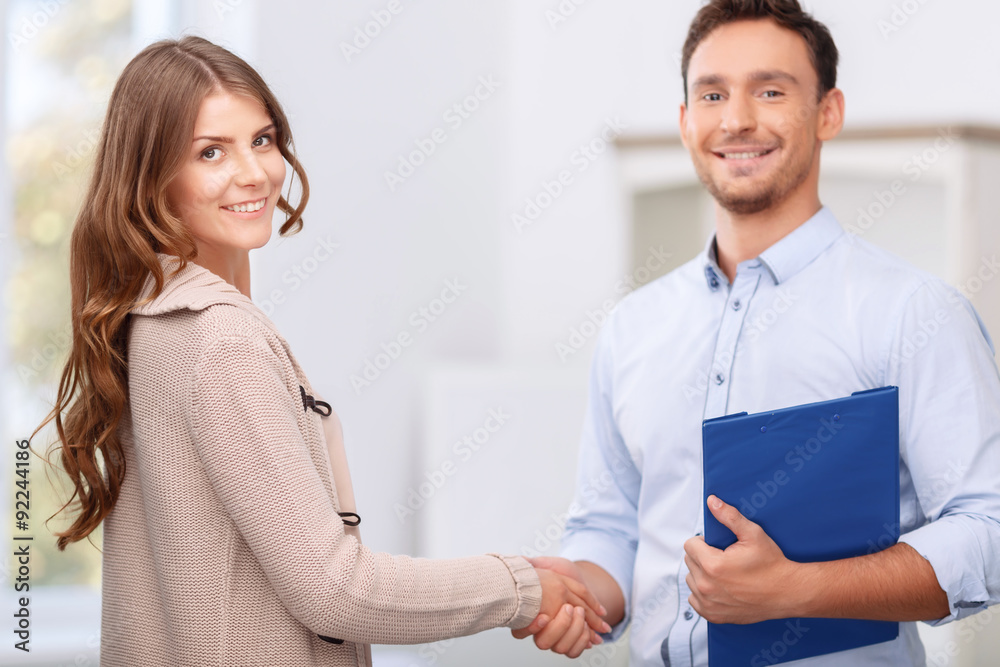 Pleasant realtor showing flat to client Pleasant realtor showing flat to client