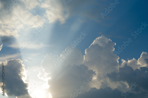 Sunlight bursting through clouds on beautiful summer day