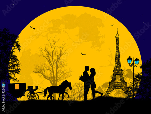 Carriage and lovers at night in Paris