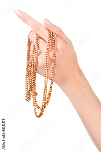 female hand with golden cha...