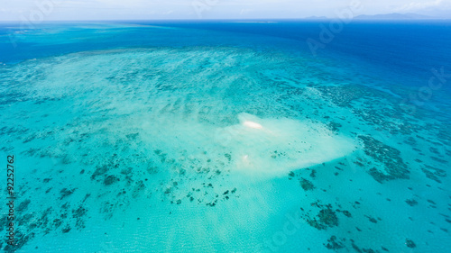 Aerial view of Great Barrier Reef with coral sand cay beach, Australia