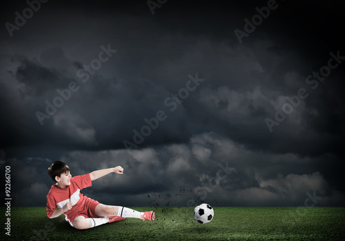 Young soccer player © adam121