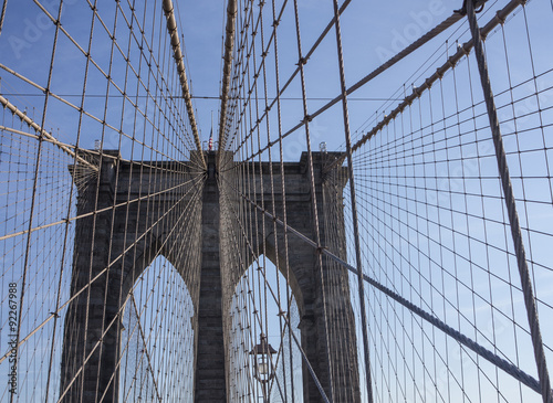 Crossing Brooklyn Bridge on a sunny day NYC