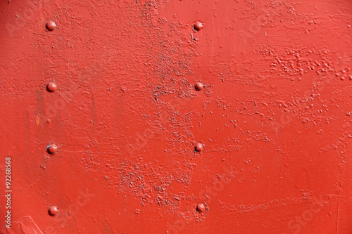 Rusty iron wall covered with paint