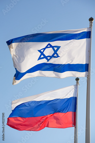 Russain Israel flags together symbol of friendship of two countr photo